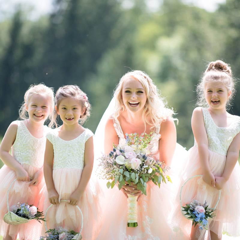 the bride with flower girls
