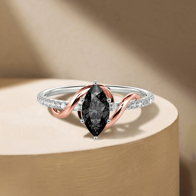 marquise-cut sidestone engagement ring