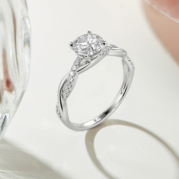 round side-stone engagement ring