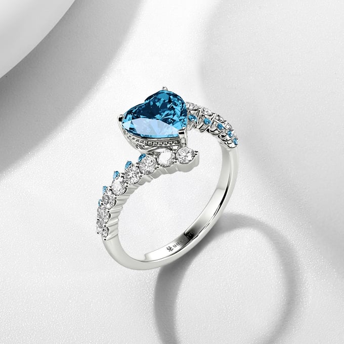 side-stone engagement ring