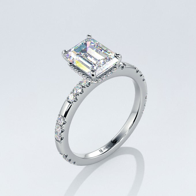 moissanite side-stone ring