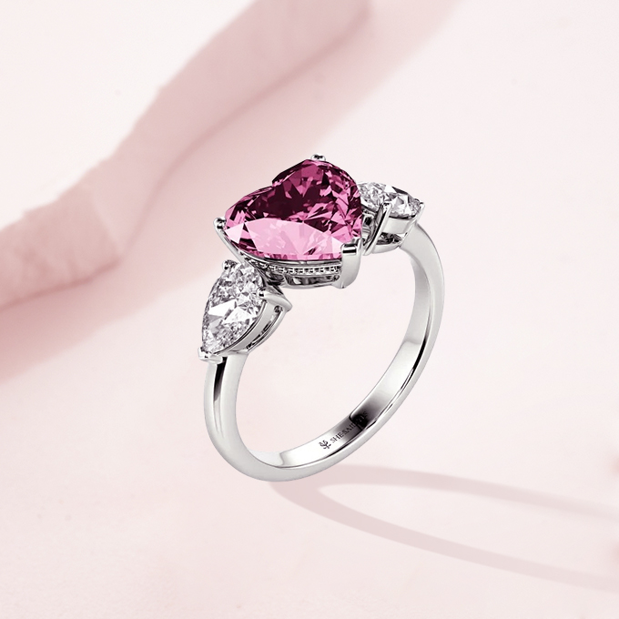 heart three-stone engagement rings