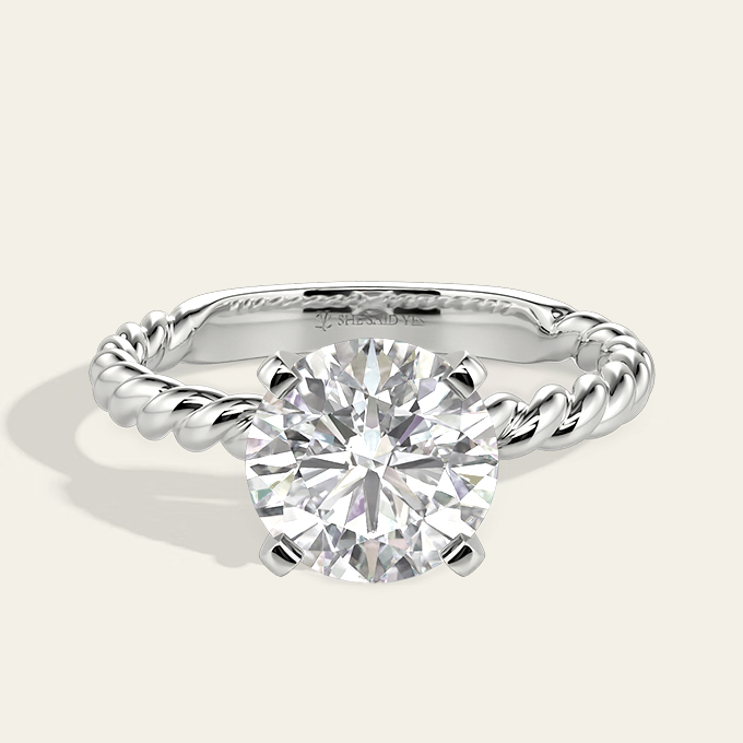 round-cut solitaire ring