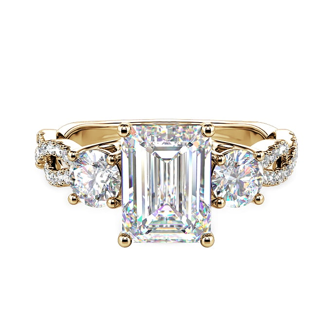 emerald cut three stone engagement ring