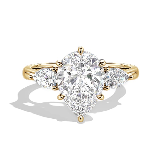 pear-cut three stone engagement ring