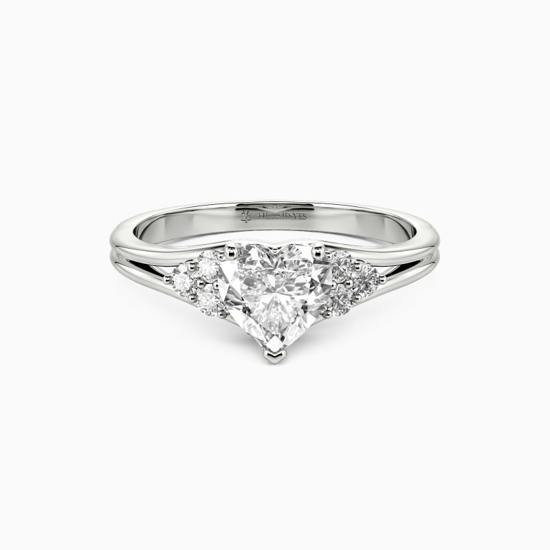 heart-cut side-stone engagement ring