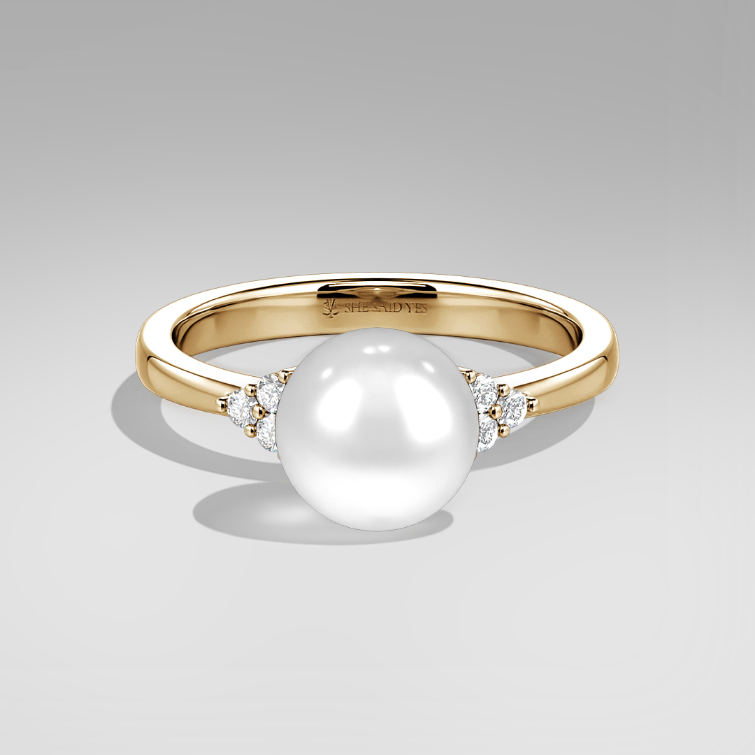 pearl side-stone ring