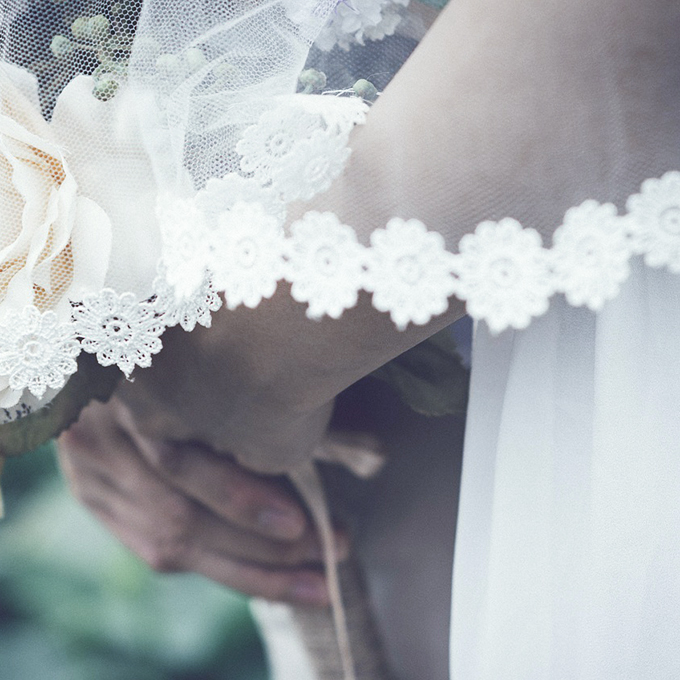 a bride holds a bouquet