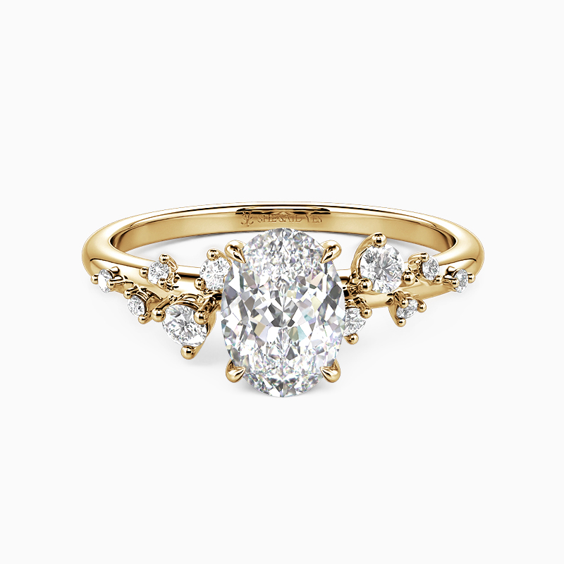 oval-cut diamond side-stone engagement ring