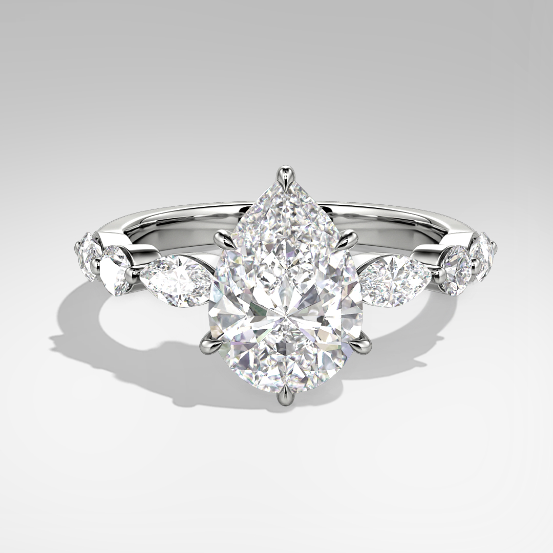 pear-cut side-stone engagement ring