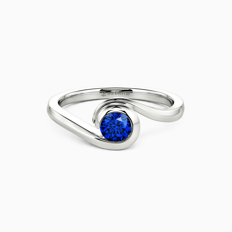 solitaire ring with sapphire blue gemstone