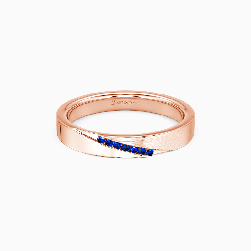 wedding band with sapphrie blue gemstones