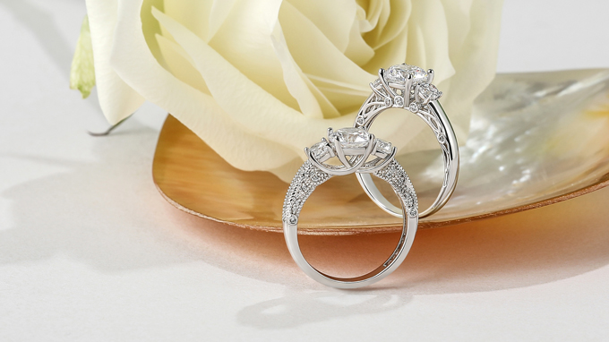 vintage-inspired three-stone engagement rings