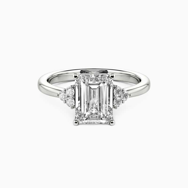 emerald-cut side stone engagement ring