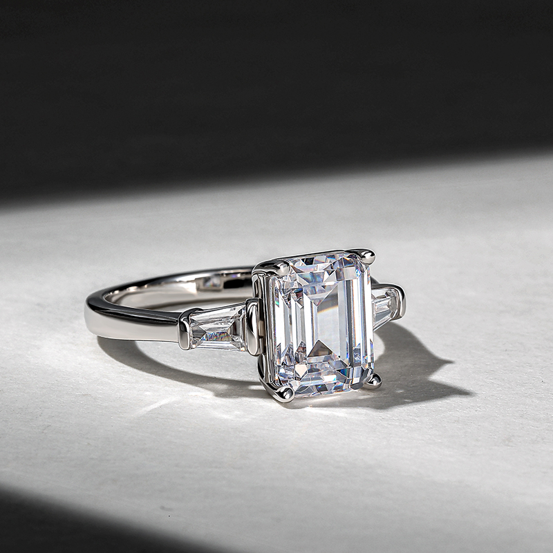 emerald-cut three-stone ring