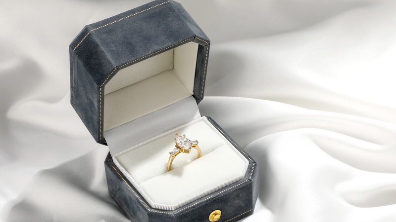 marquise-cut three-stone engagement ring