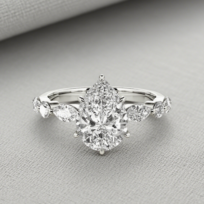 2ct Pear Cut Side Stone Engagement Ring