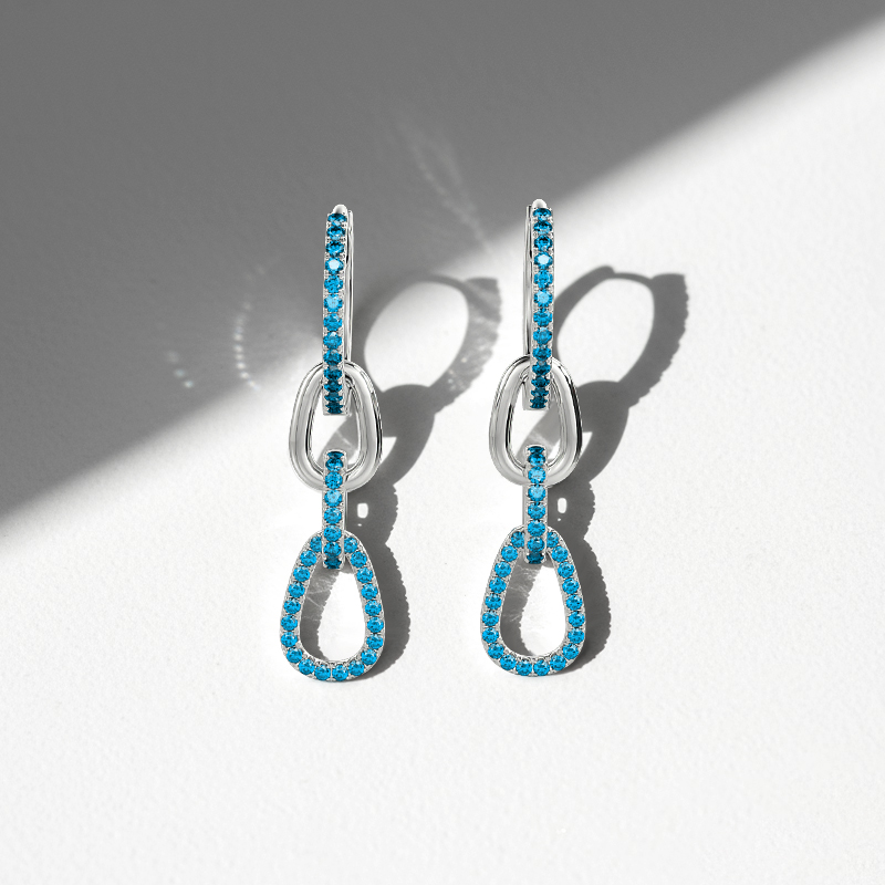 stylish earrings with Swiss blue gemstones