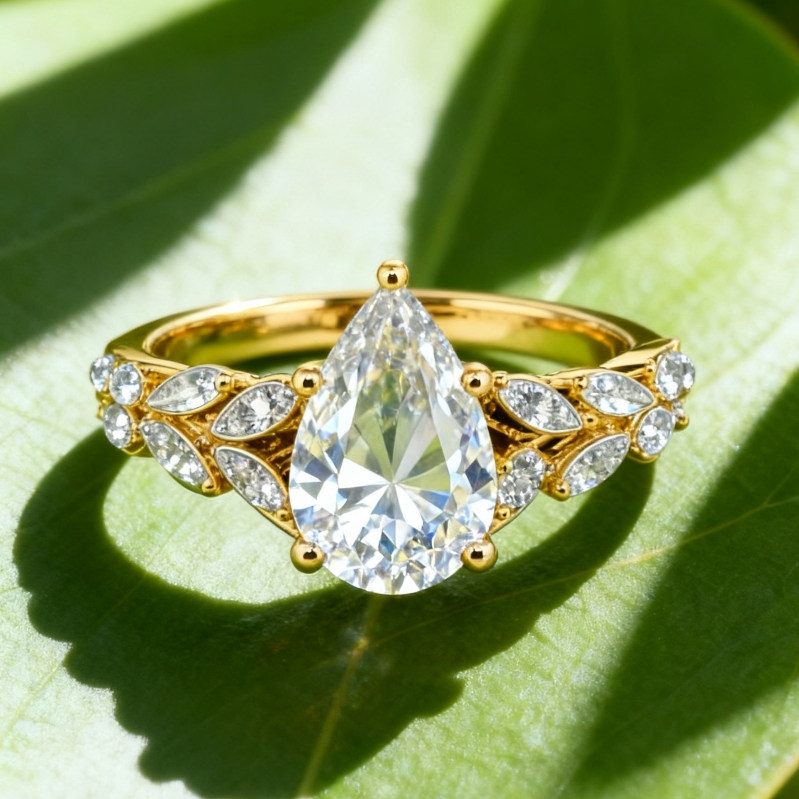 Everything I Do Pear Cut Side Stone Engagement Ring