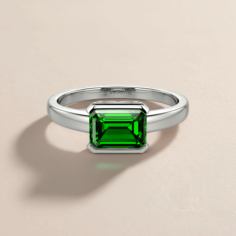 east-west semi-bezel engagement ring