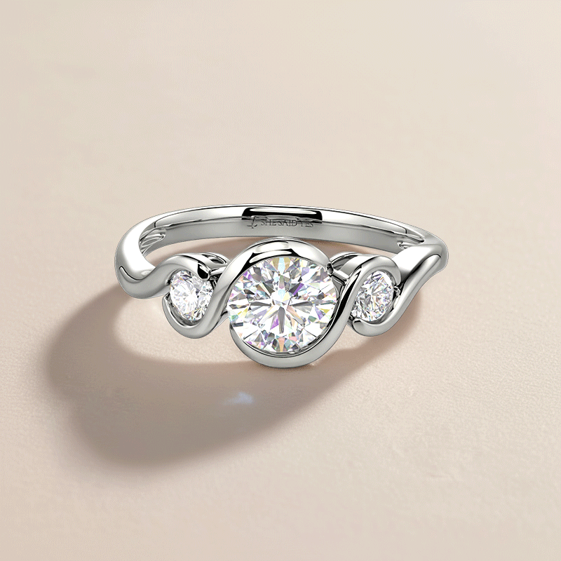 bezel three-stone ring