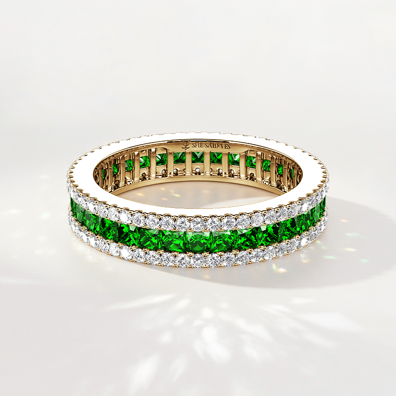 full eternity band with emerald green gems