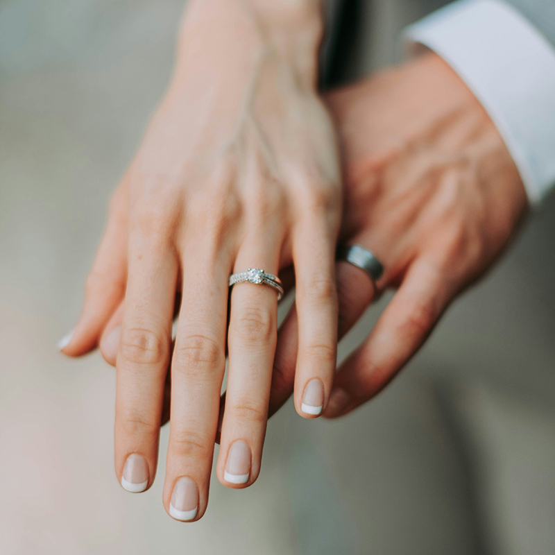 engagement ring and wedding rings