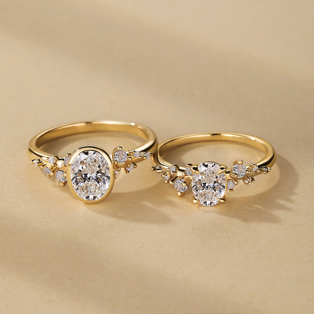 oval-cut side-stone engagement rings