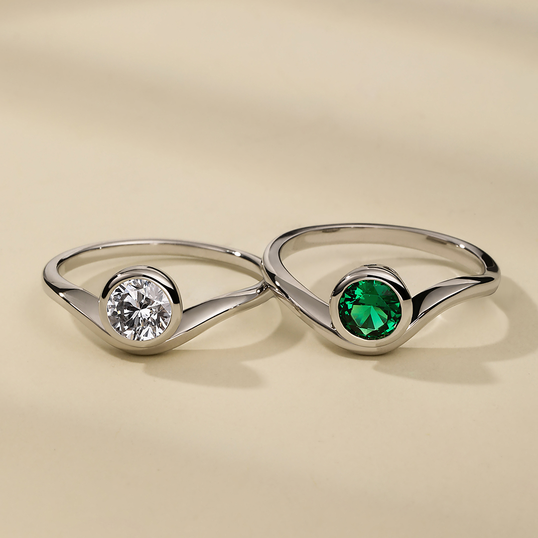 diamond engagement ring & emerald engagement ring