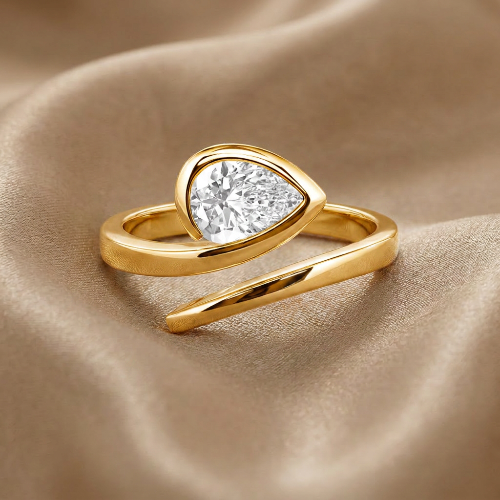 East-west Bezel pear cut Engagement ring