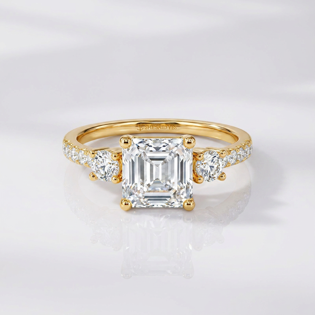 protected setting three-stone engagement ring