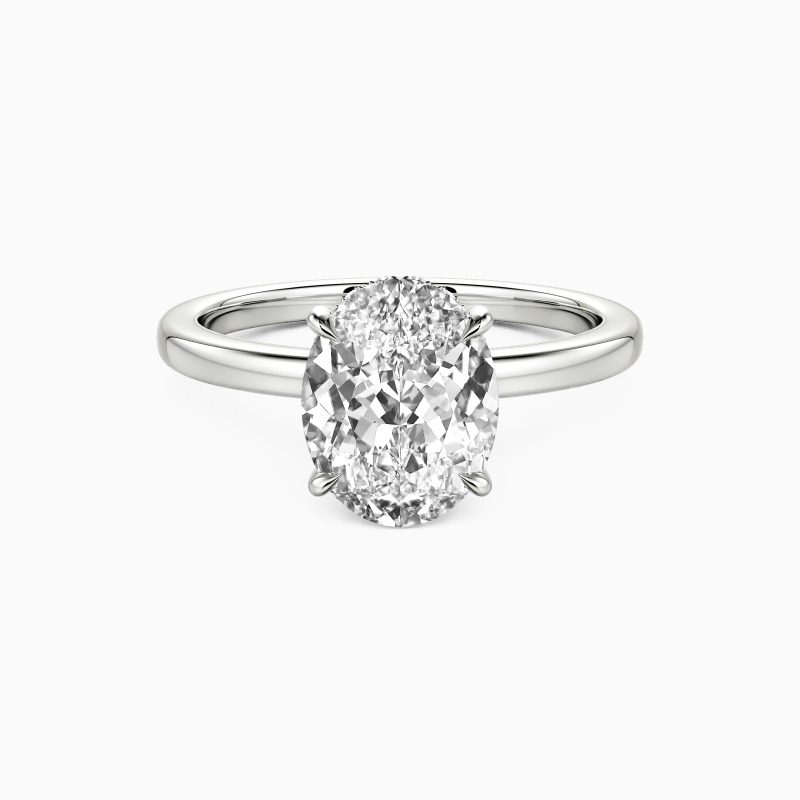 oval cut side stone engagement ring