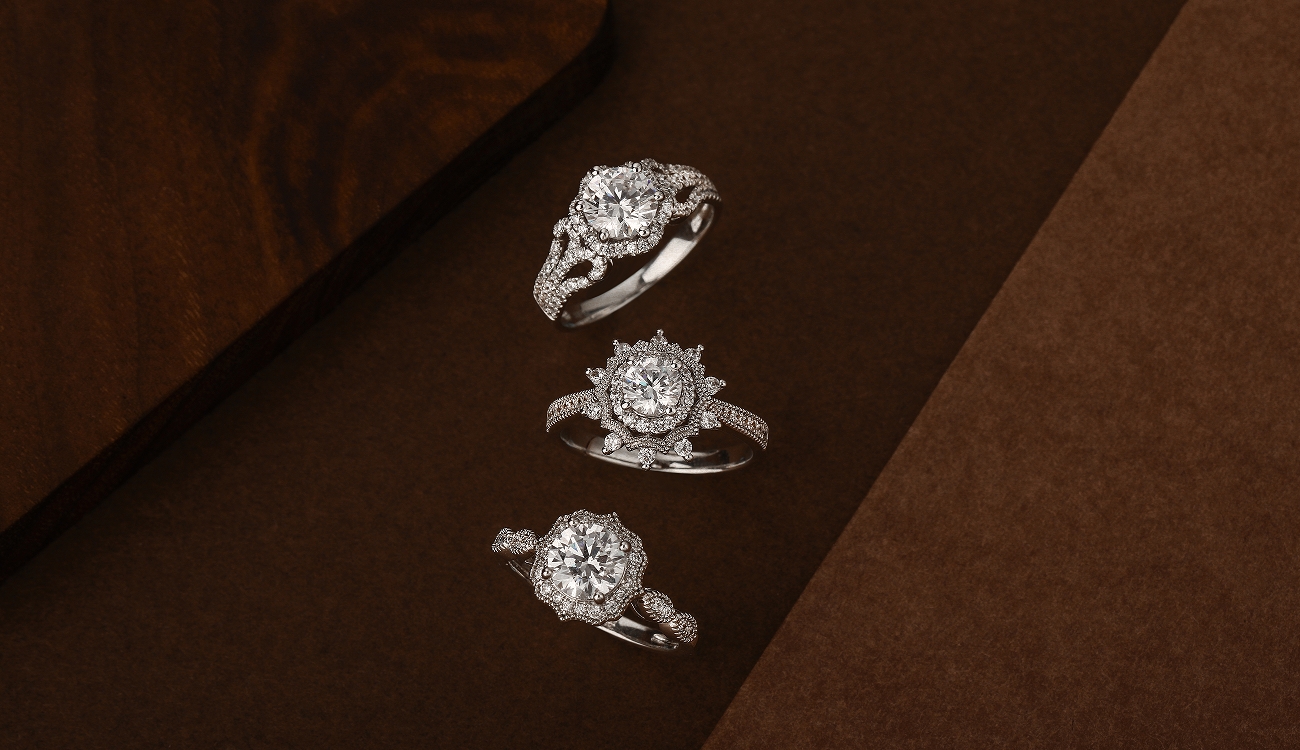 three vintage style engagement rings
