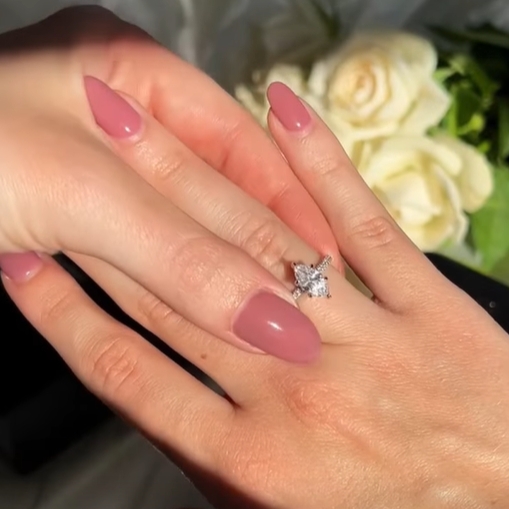 Marquise engagement ring on hand